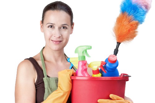 Cleaner using safety equipment during a Putney cleaning service