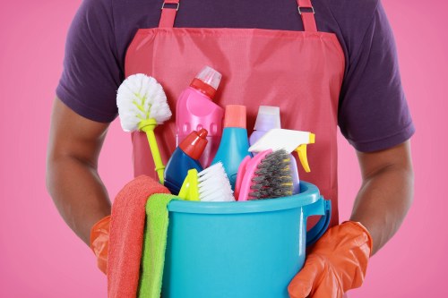 Professional cleaner wearing PPE while working