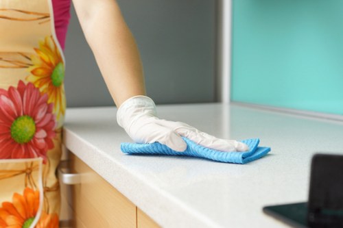 Cleaning team preparing a service booking for a UK property