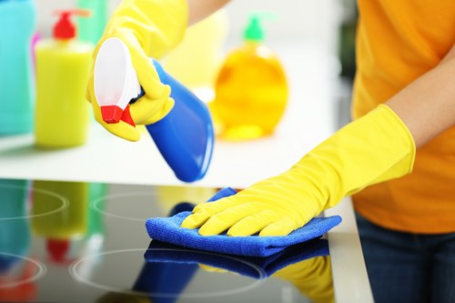 Cleaning team reviewing safety instructions and protective measures